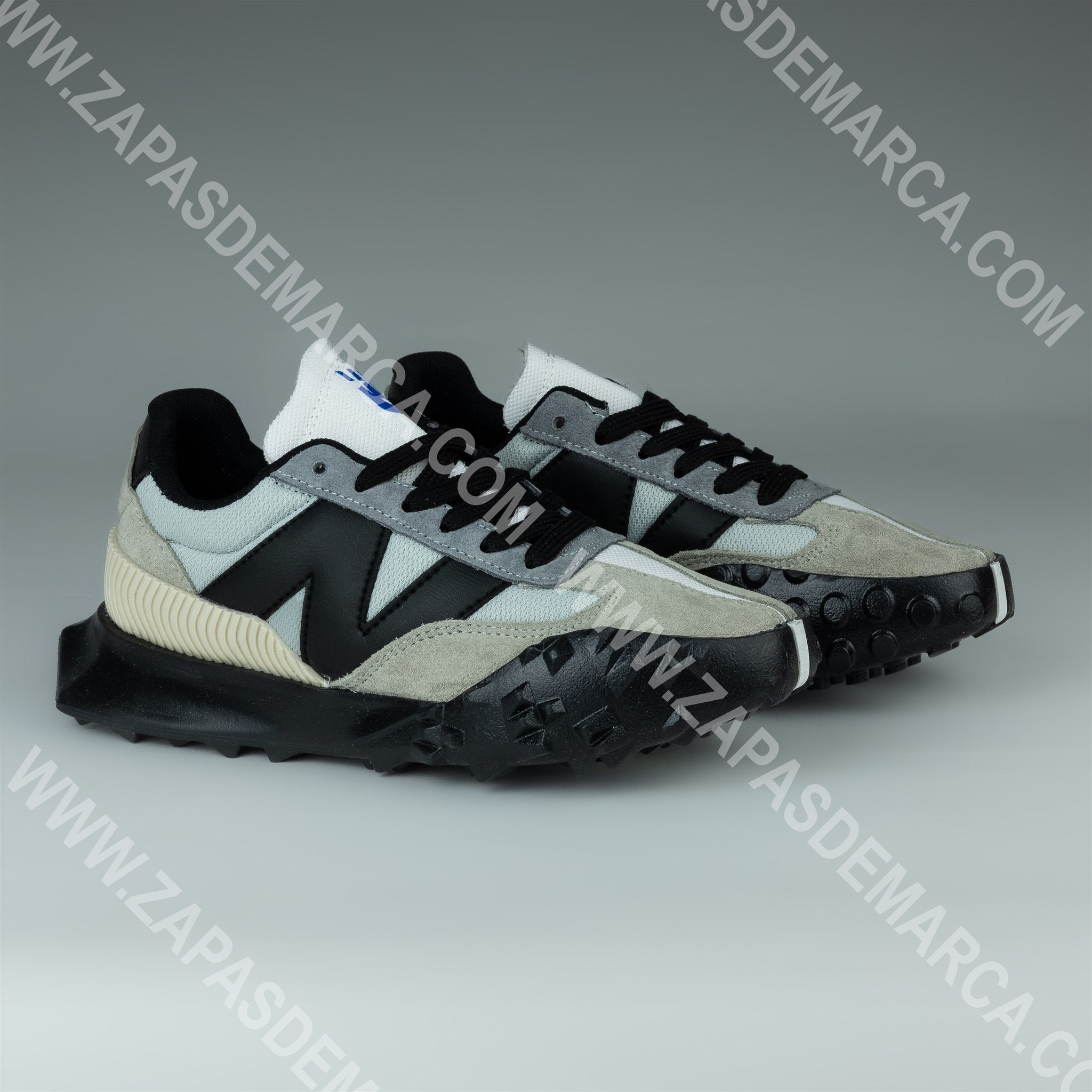 New balance gris y negro best sale