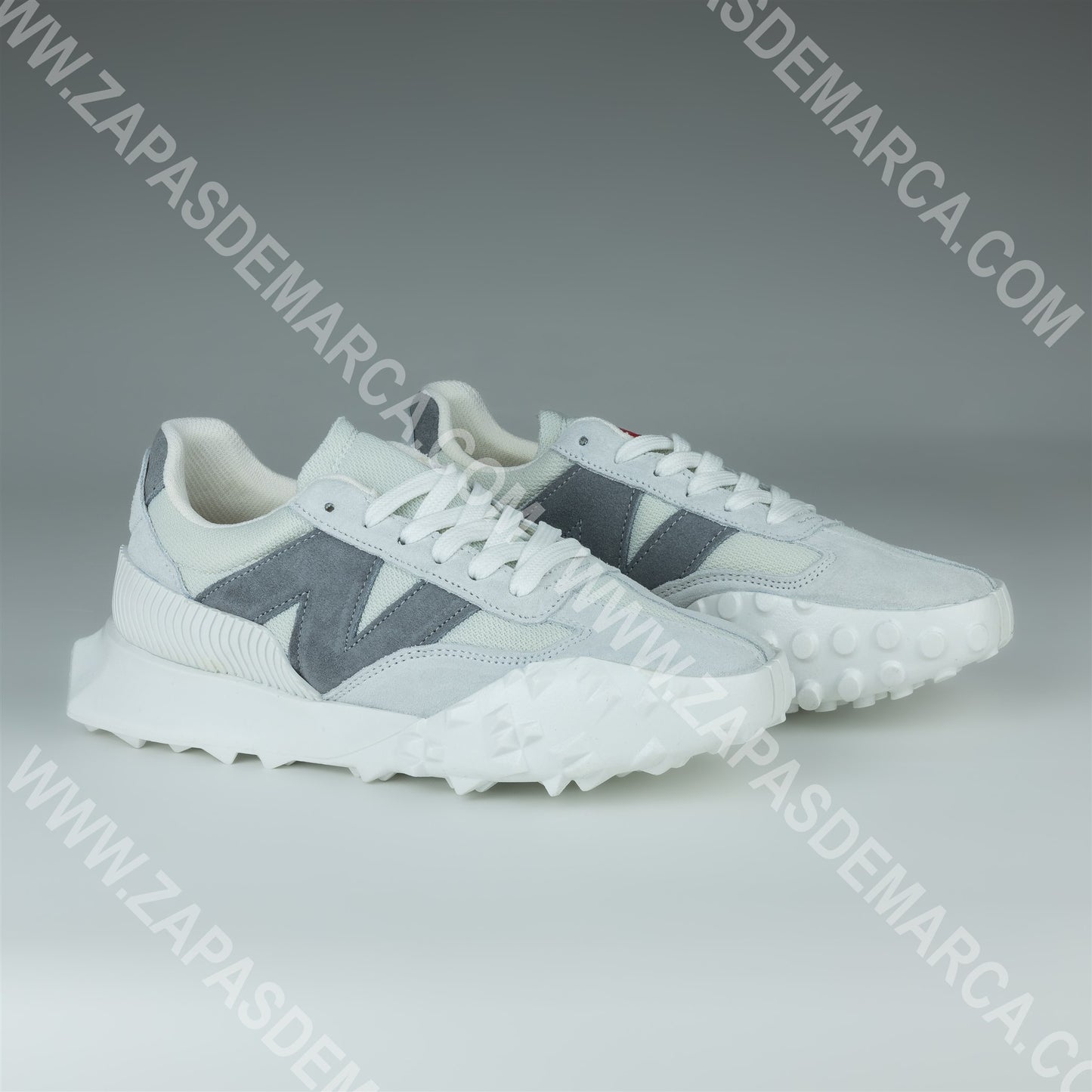 NEW BALANCE GRIS Y BLANCO